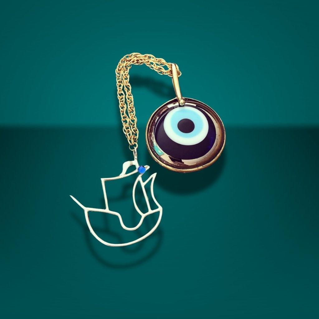 Charms with evil eye stone