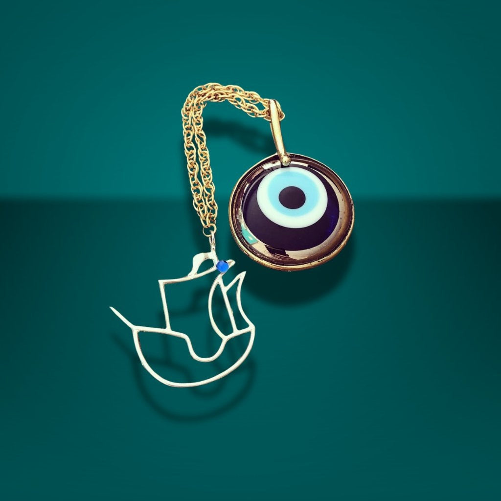 Charms with evil eye stone