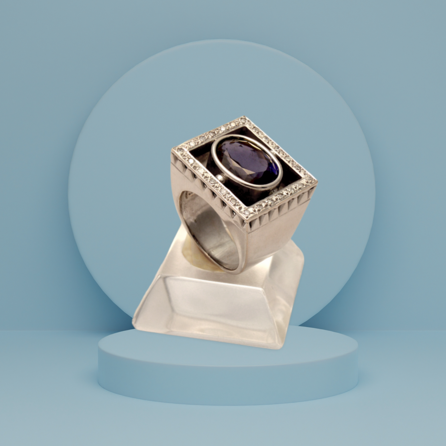 Ring in white gold 18K. with Iolite 9 c. and Brilliants 1.25c.(B-74)