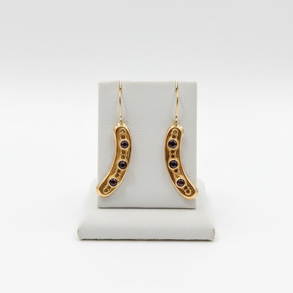 Earrings in 14k gold with Garnet