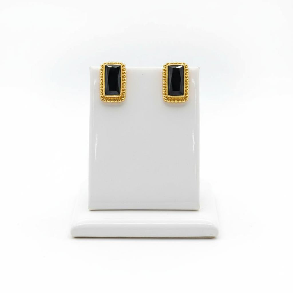 Earrings in 18k gold with Pine Tree Tourmalines