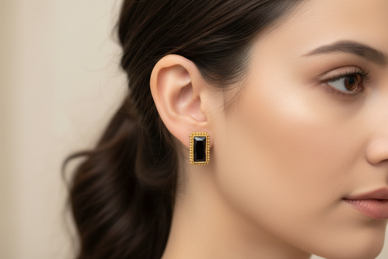 Earrings in 18k gold with Pine Tree Tourmalines