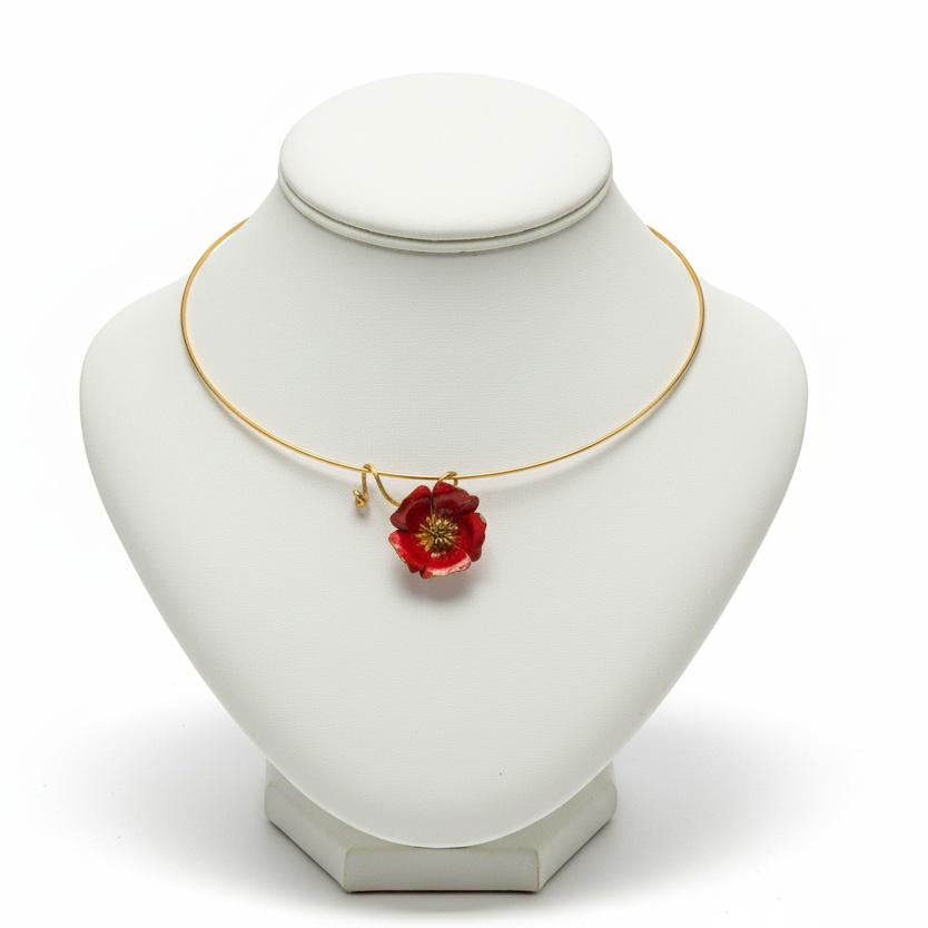 Necklace in 18k gold and a flower pendant with enamel