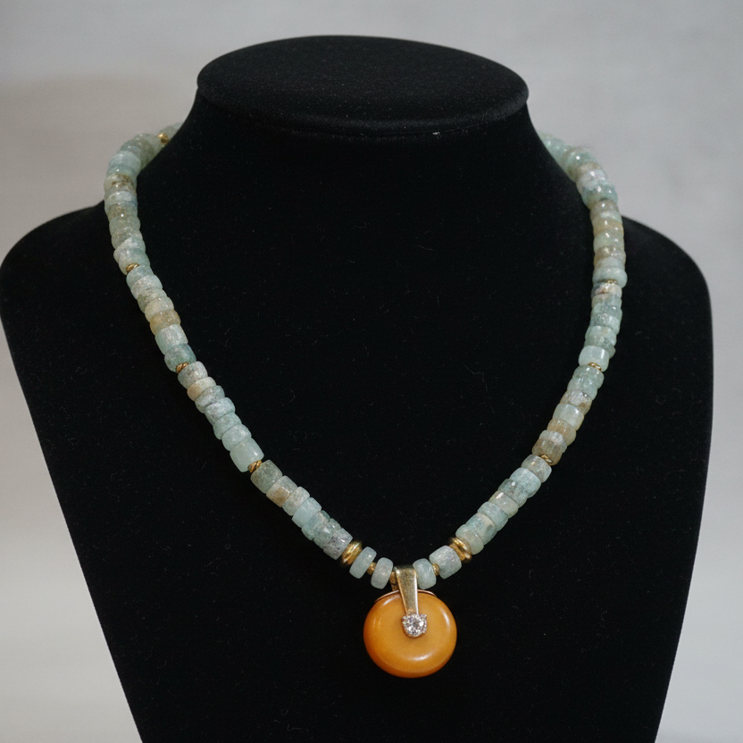 Necklace with Aquamarine gemstones, Amber medallion with diamonds and gold 18k elements