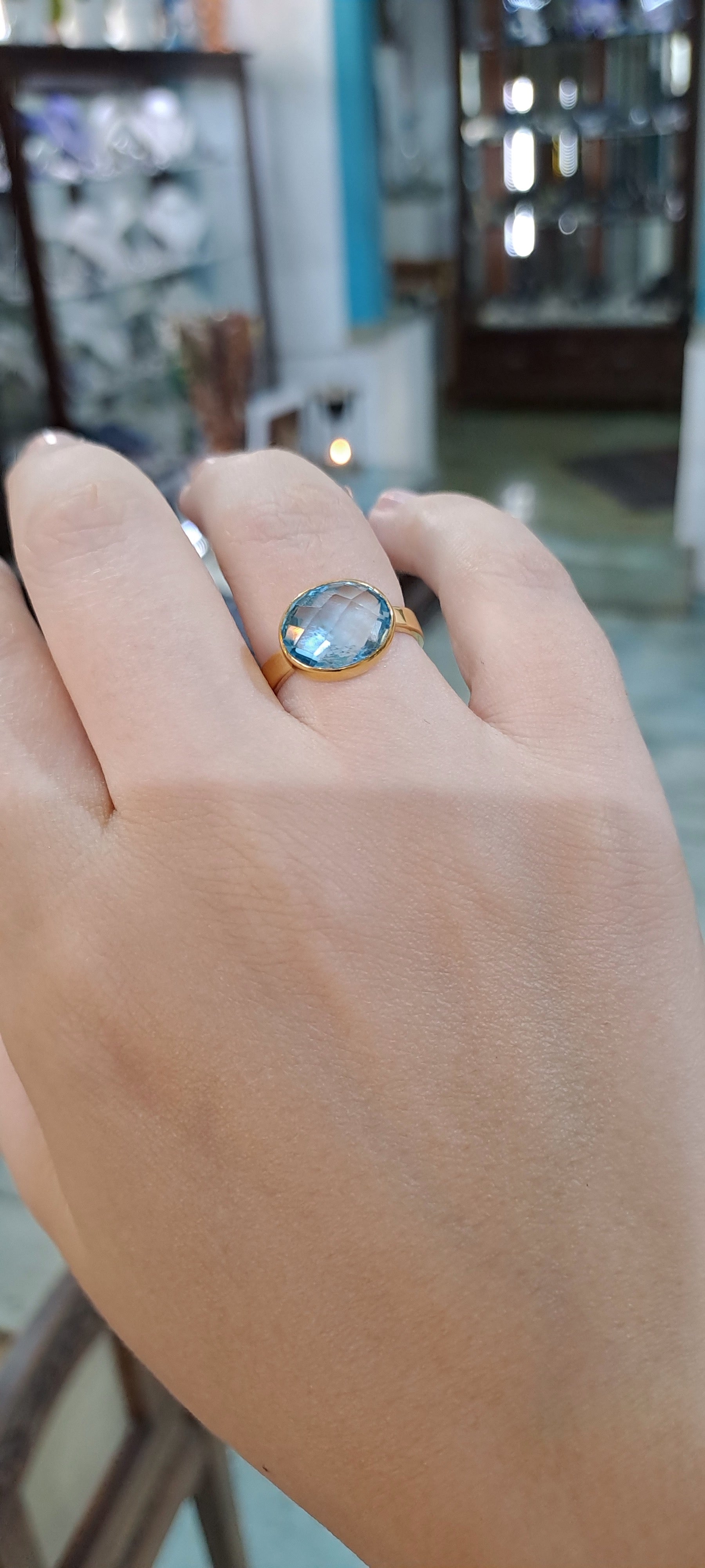 Ring in 14k gold with a blue topaz (B-122) - Dinos-Virginia