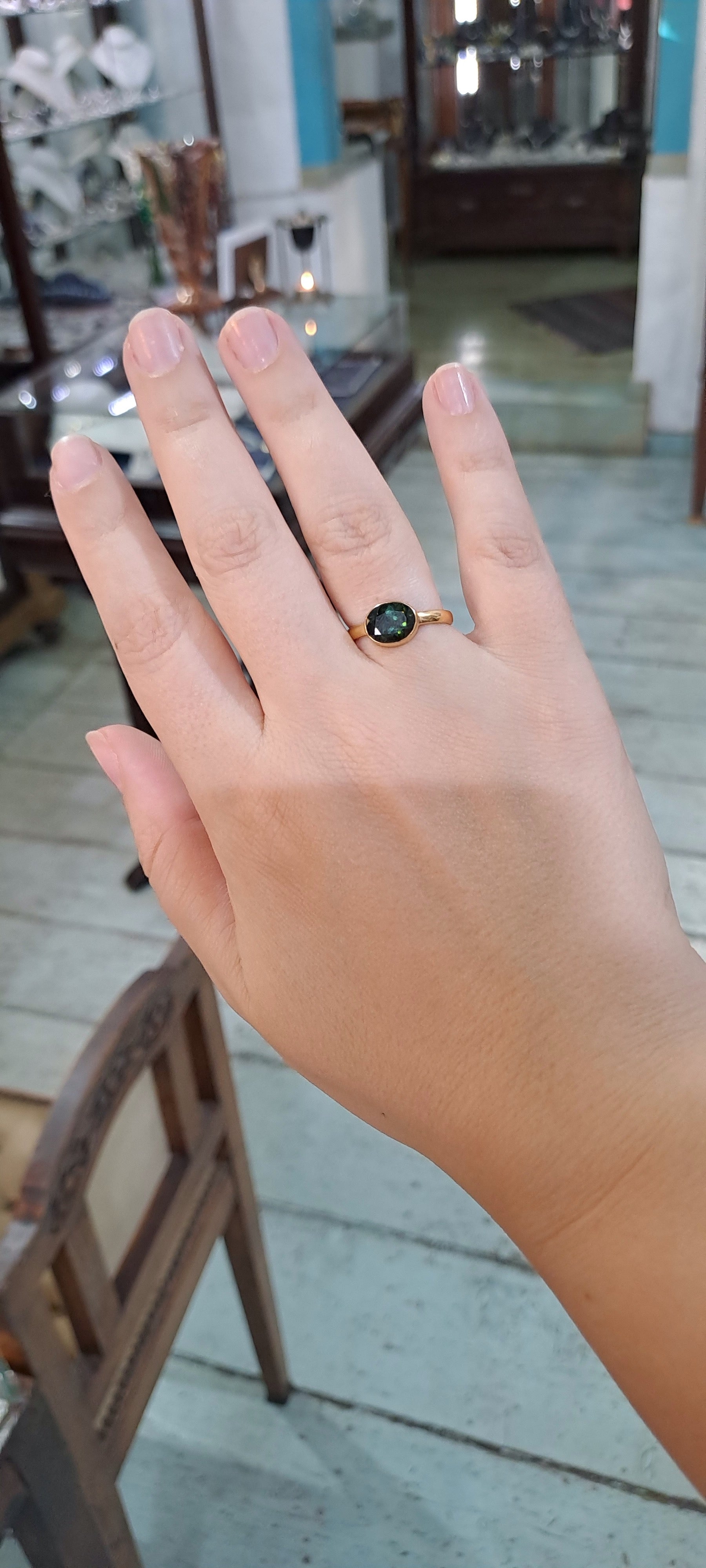 Ring in 14k gold with a green tourmaline (B-117)