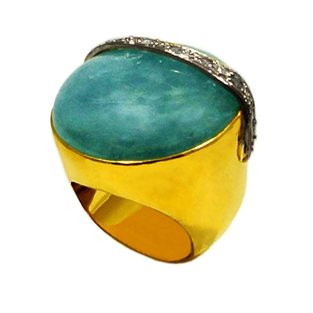 Ring in 18k Gold with a 50 ct. aqua marin cabochon and diamonds (B-16)