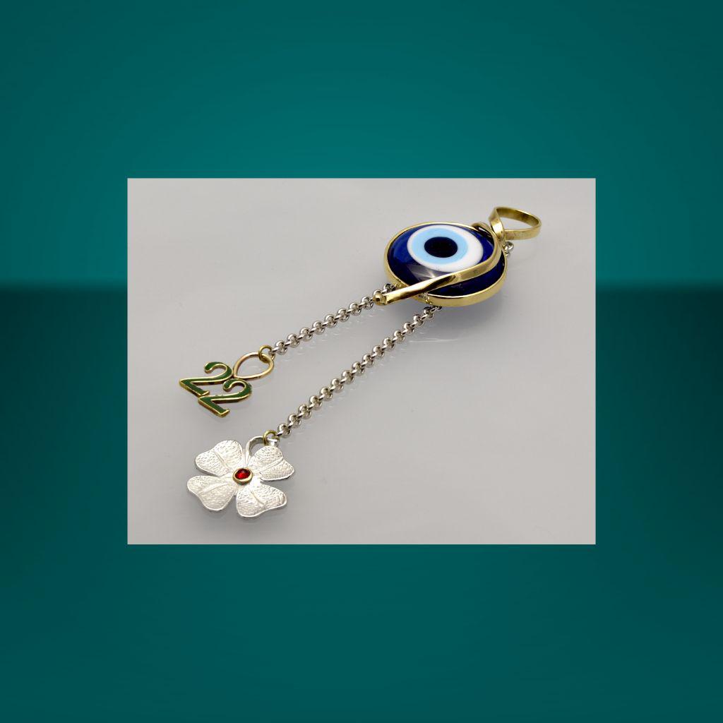Charms with evil eye stone
