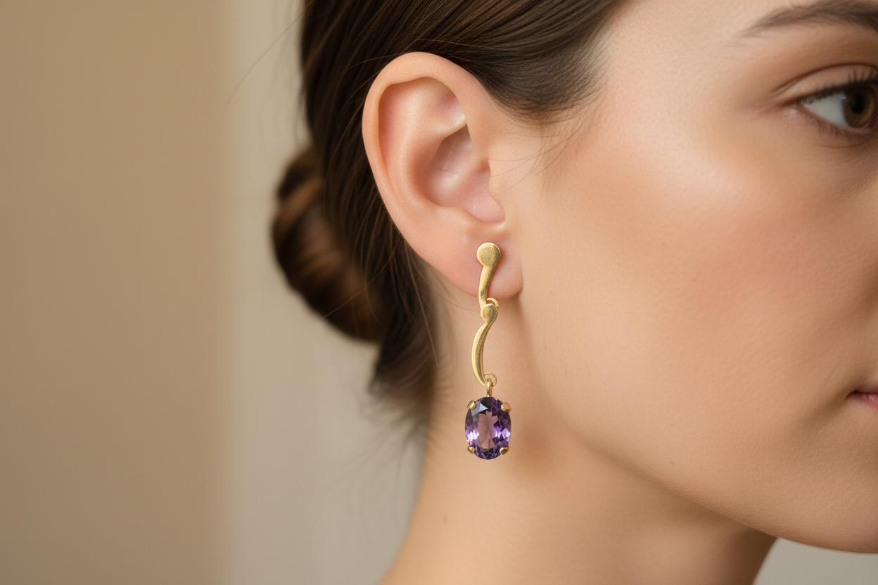 Amethyst oval faceted cutaneous 18k gold earrings