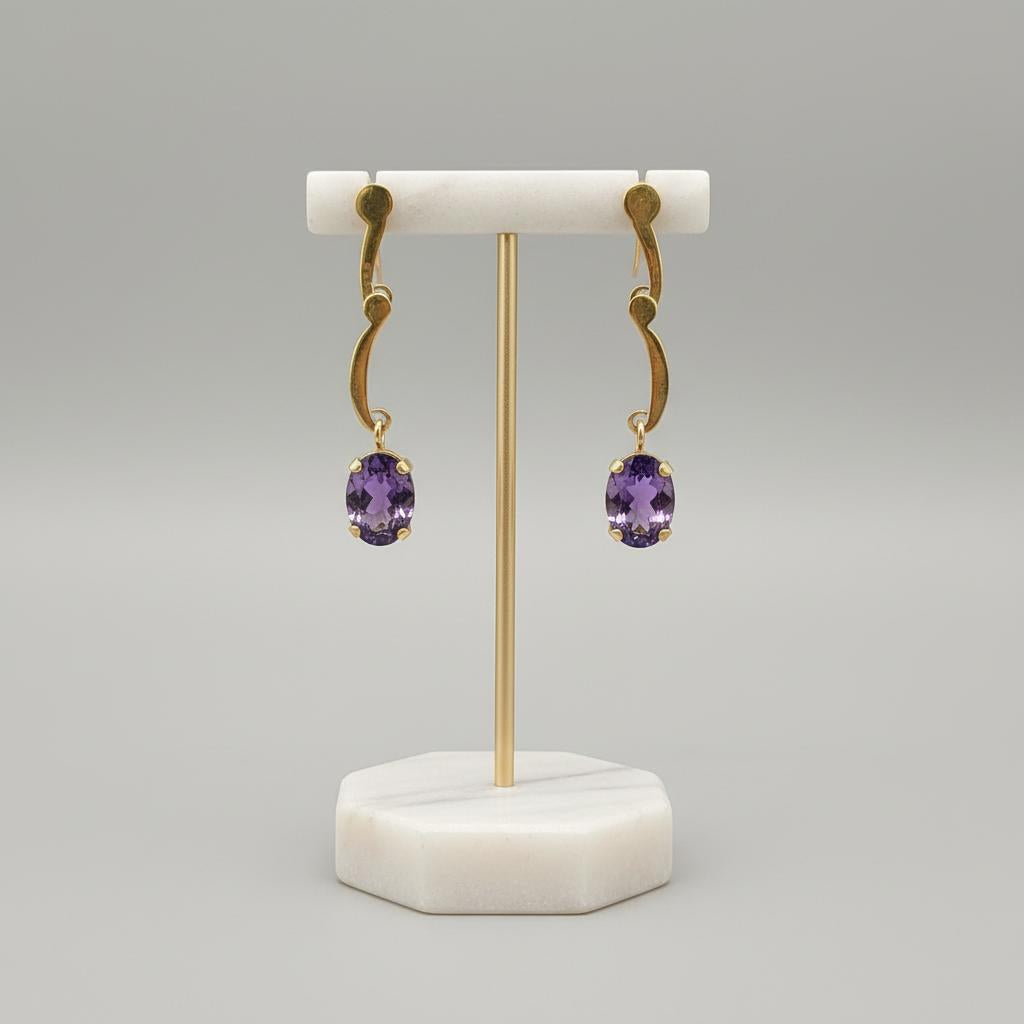 Amethyst oval faceted cutaneous 18k gold earrings