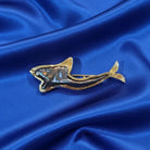 Brooch in 18k gold with Black Ostrich Tahitian pearl, fish design brooch