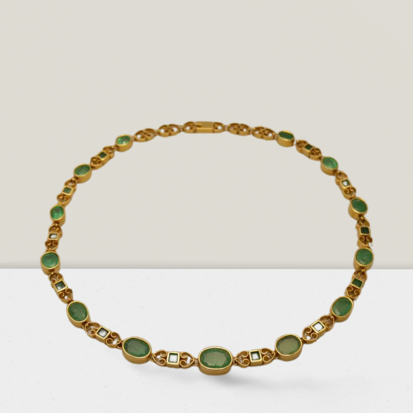 Necklace in 18k gold Perforated with Zambian emeralds