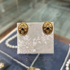 Earrings in 18k gold