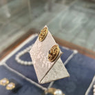 Earrings in 18k gold