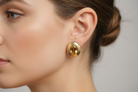 Earrings in 18k gold with Citrine stones