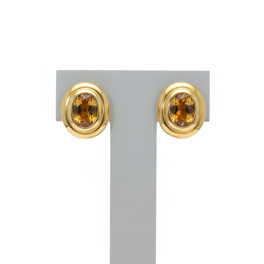 Earrings in 18k gold with Citrine stones