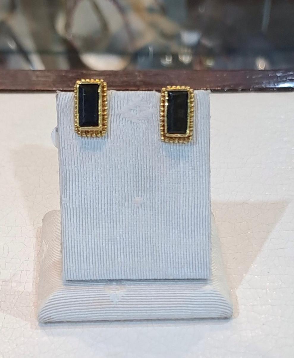 Earrings in 18k gold with Pine Tree Tourmalines