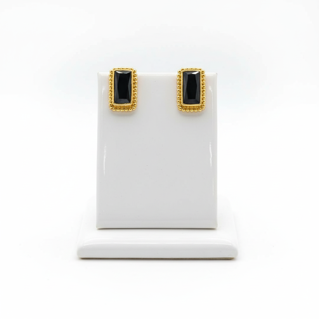 Earrings in 18k gold with Pine Tree Tourmalines