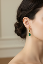 Earrings in steel with Emeralds and 14k gold