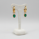 Earrings in steel with Emeralds and 14k gold