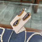 Jewellery set in 18k gold with a pearl