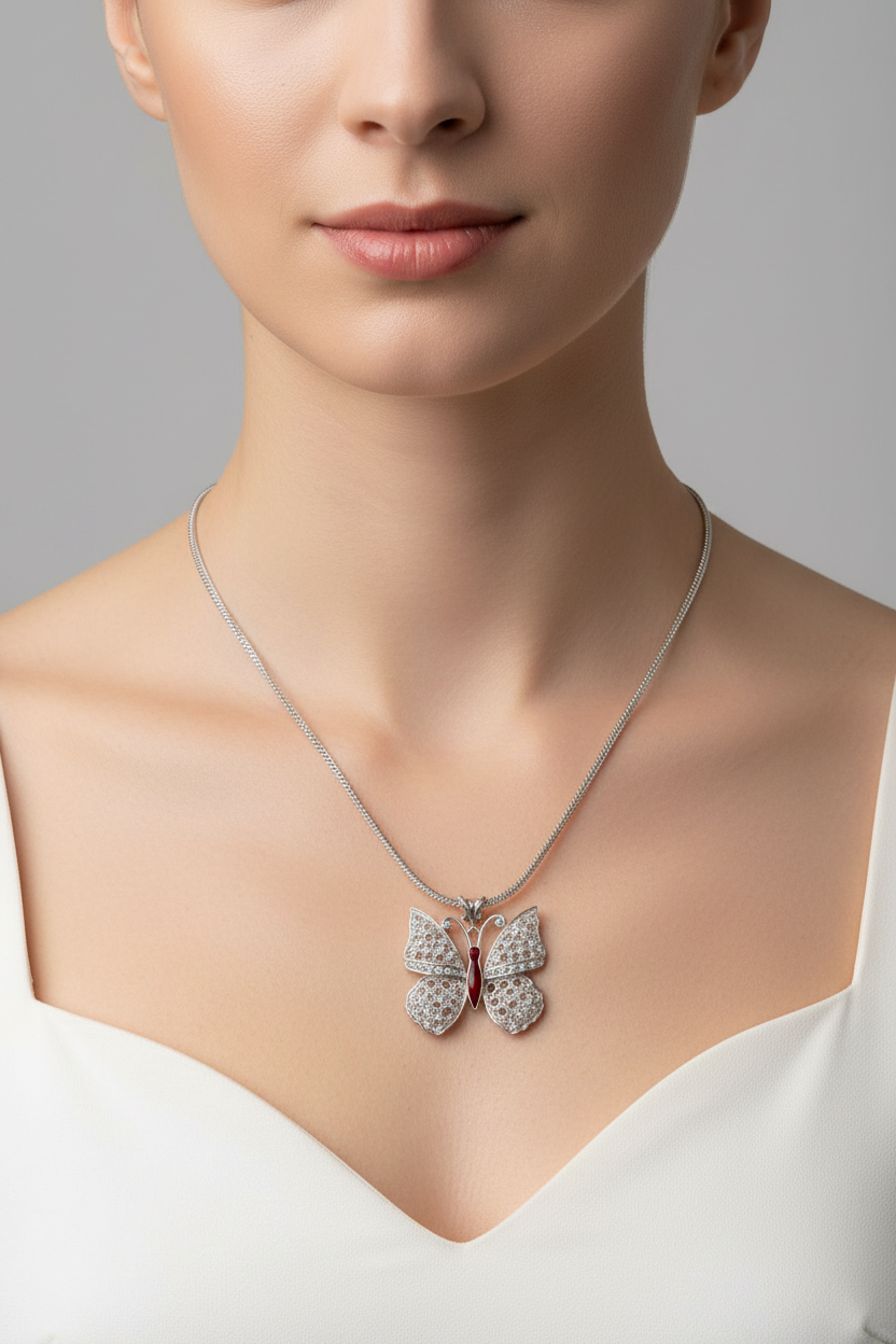 Necklace in handmade gold chain, gold butterfly with diamonds and green brilliants