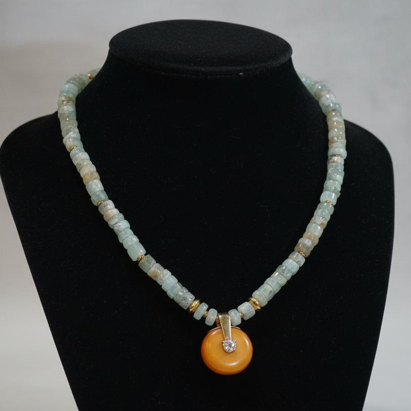 Necklace with Aquamarine gemstones, Amber medallion with diamonds and gold 18k elements
