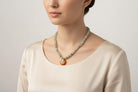 Necklace with Aquamarine gemstones, Amber medallion with diamonds and gold 18k elements