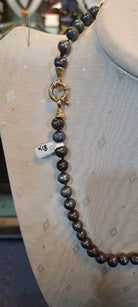 Necklace with black pearls