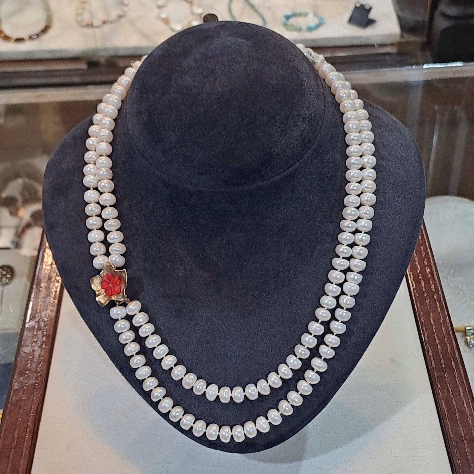 Necklace with two row pearls and 14k gold element, flower design element