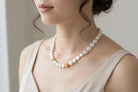 Necklace with white Keisi pearls and 18k gold elements