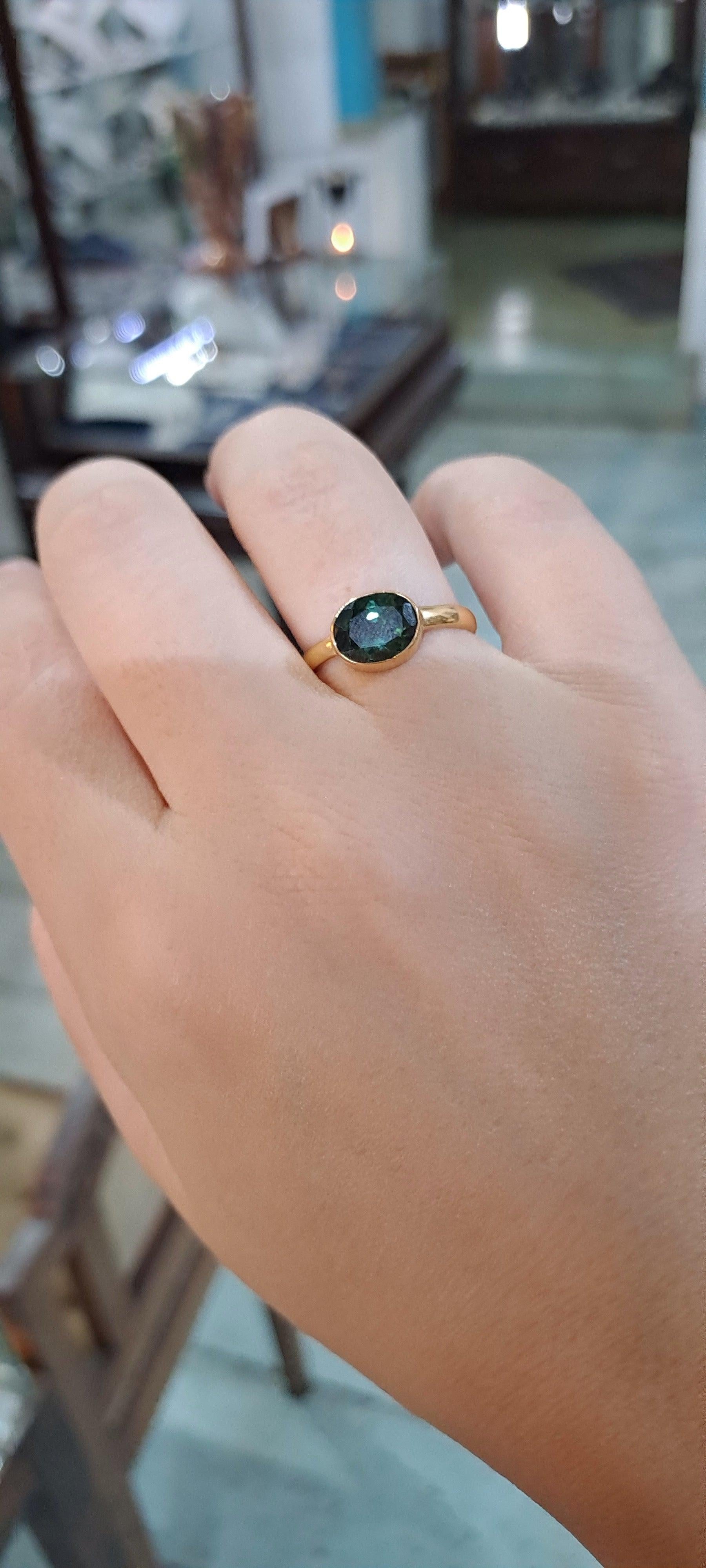 Ring in 14k gold with a green tourmaline (B-117)