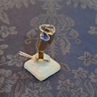 Ring in 18k gold with a phenakite and a blue Saphhire (B-121)