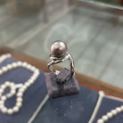 Ring in 18k gold with a silver pearl