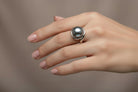 Ring in 18k gold with a silver pearl (B-145)