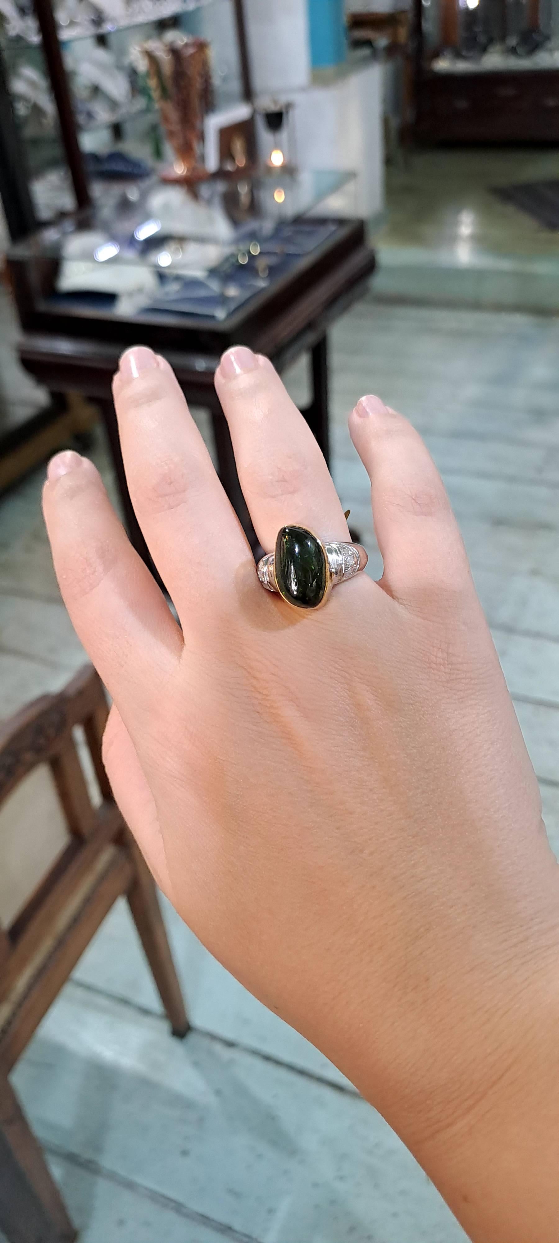 Ring in 18k gold with green tourmaline and white and yellow gold (B-113)