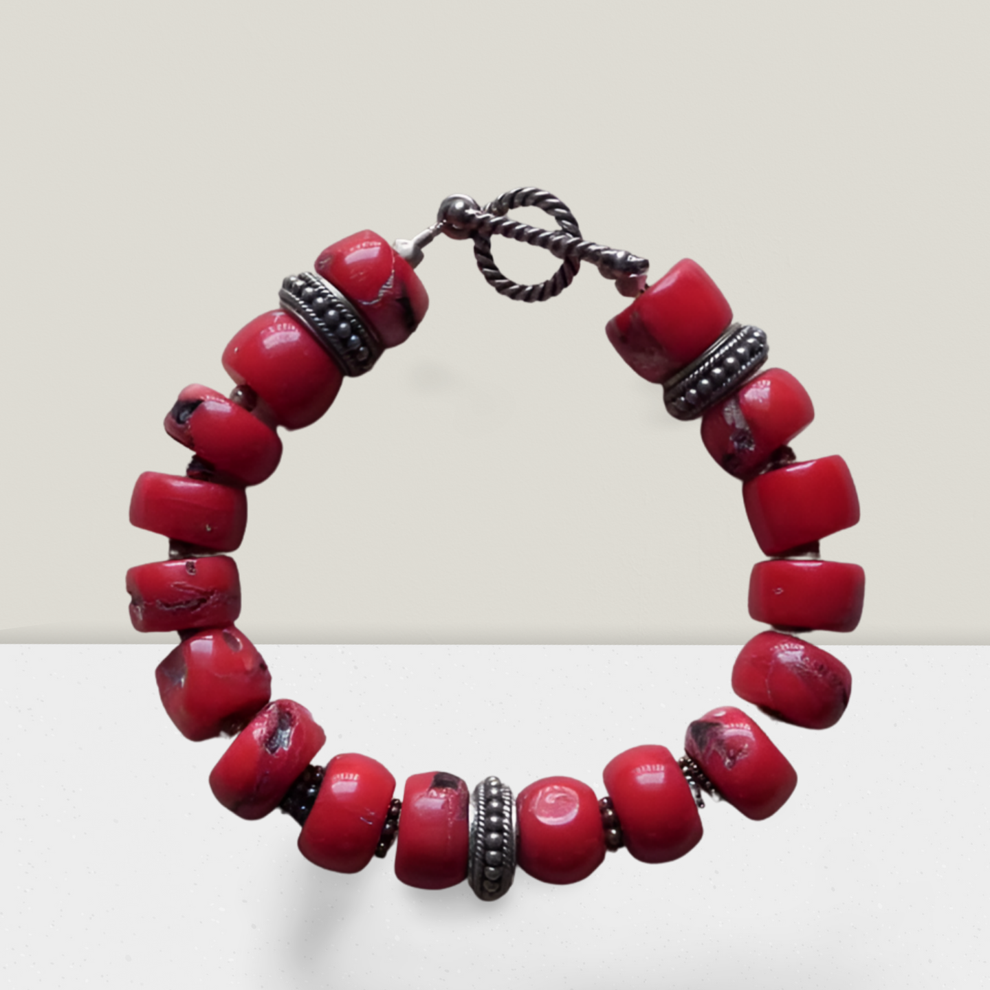 Bracelet with Coral Stones and Silver Elements (C-05)