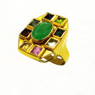 Ring in 18k Gold with a Zambian emerald and pyramid cut tourmalines (B-06)